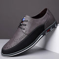 Men's casual leather shoes in black with a fabric upper, leather toe cap, rubber sole, and decorative stitching.