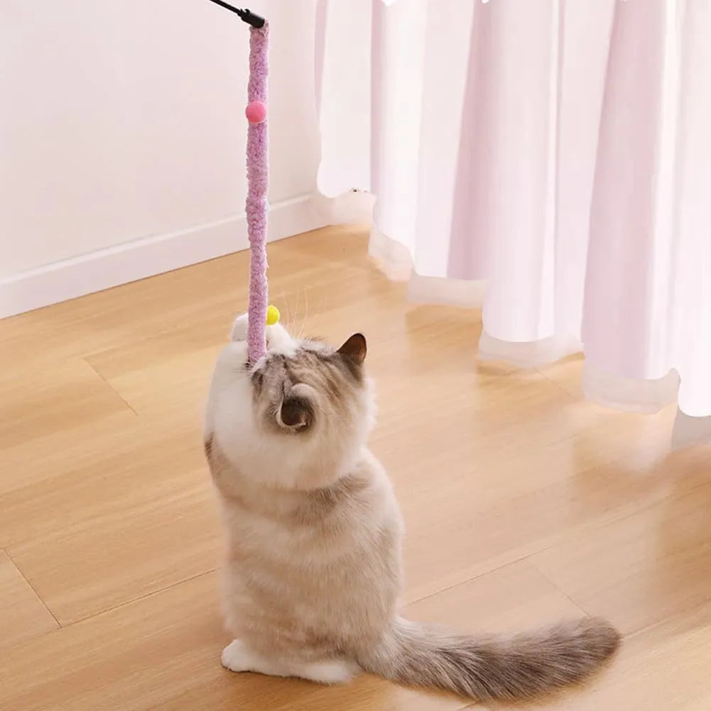 Interactive cat wand toy with colourful plush strip and bell attachment for indoor play