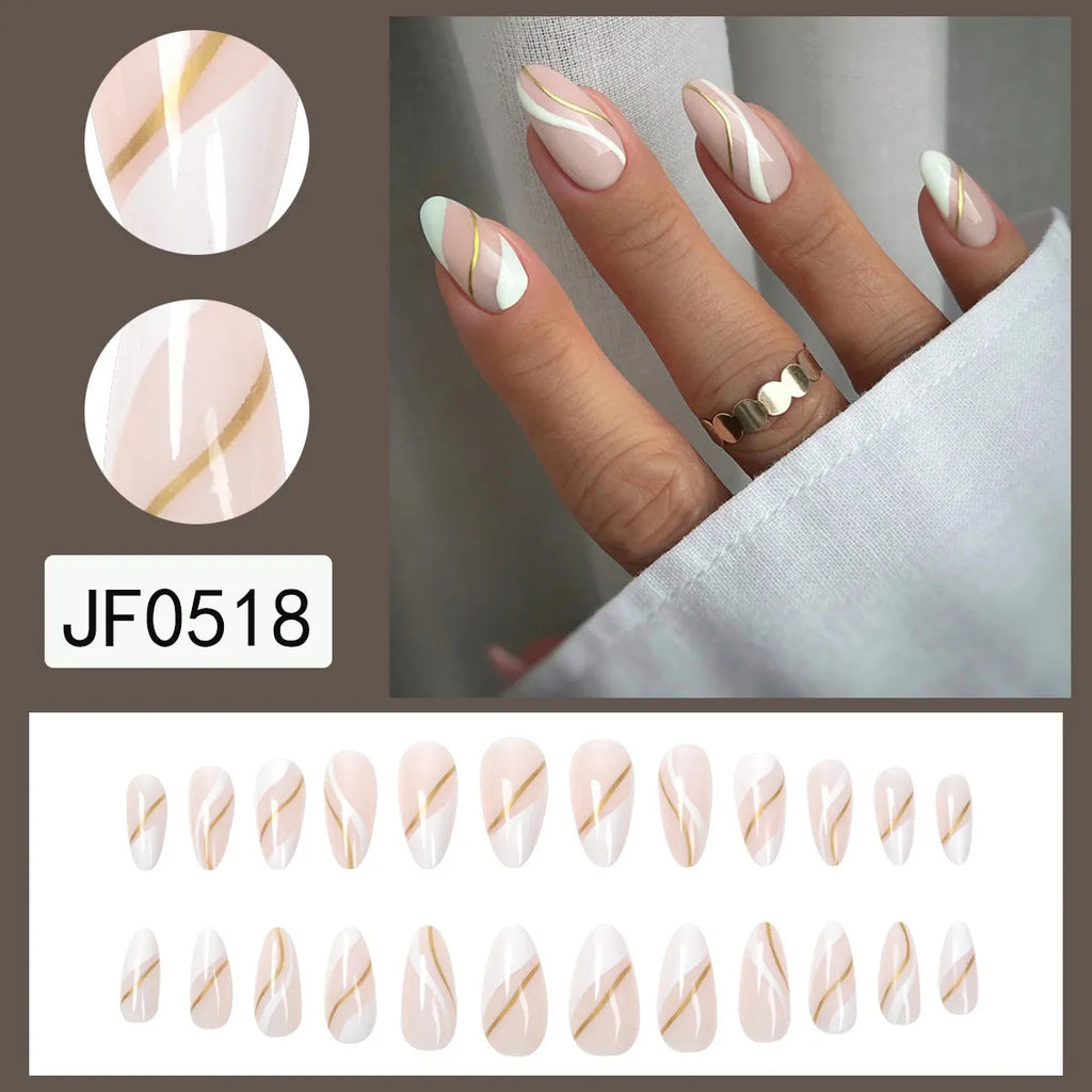 Golden lines plaid pattern on medium drop-shaped wearable nail stickers with jelly glue adhesive.