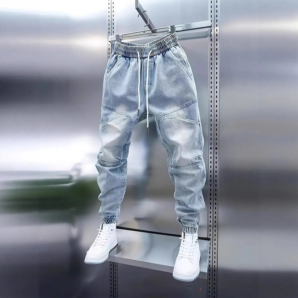 Men's light blue cotton denim skinny jeans with drawstring waist and elastic ankle bands