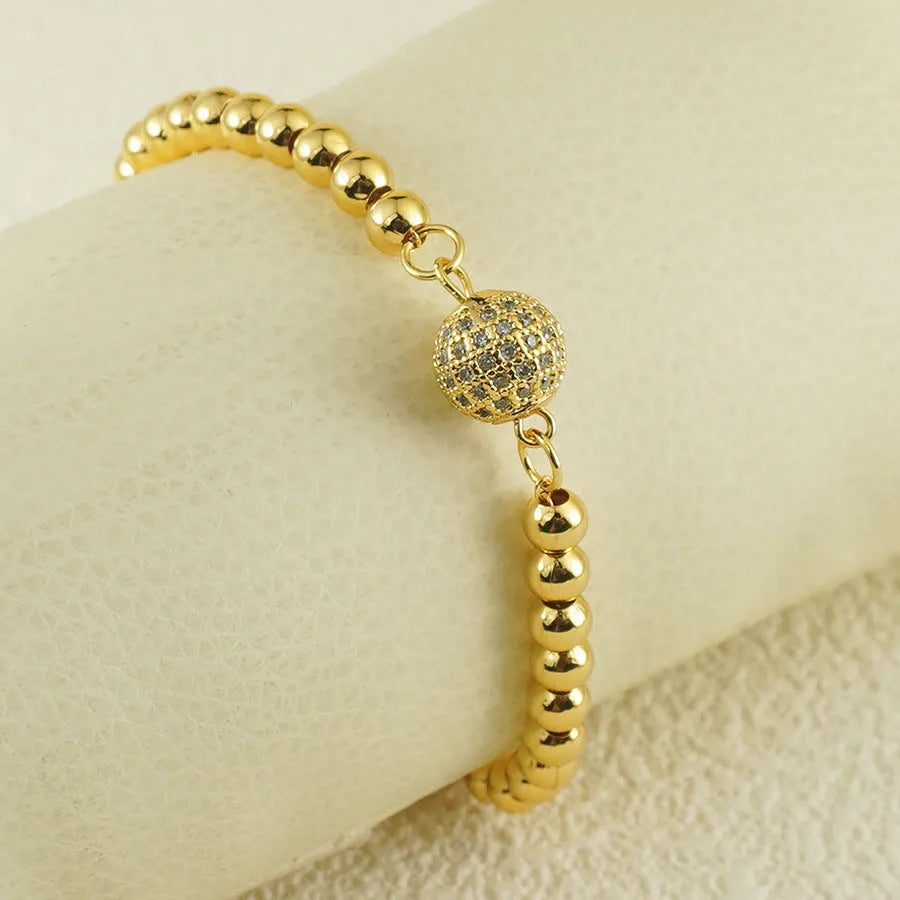 Women's heart-shaped copper bracelet with zircon stones in an Arabic style design.