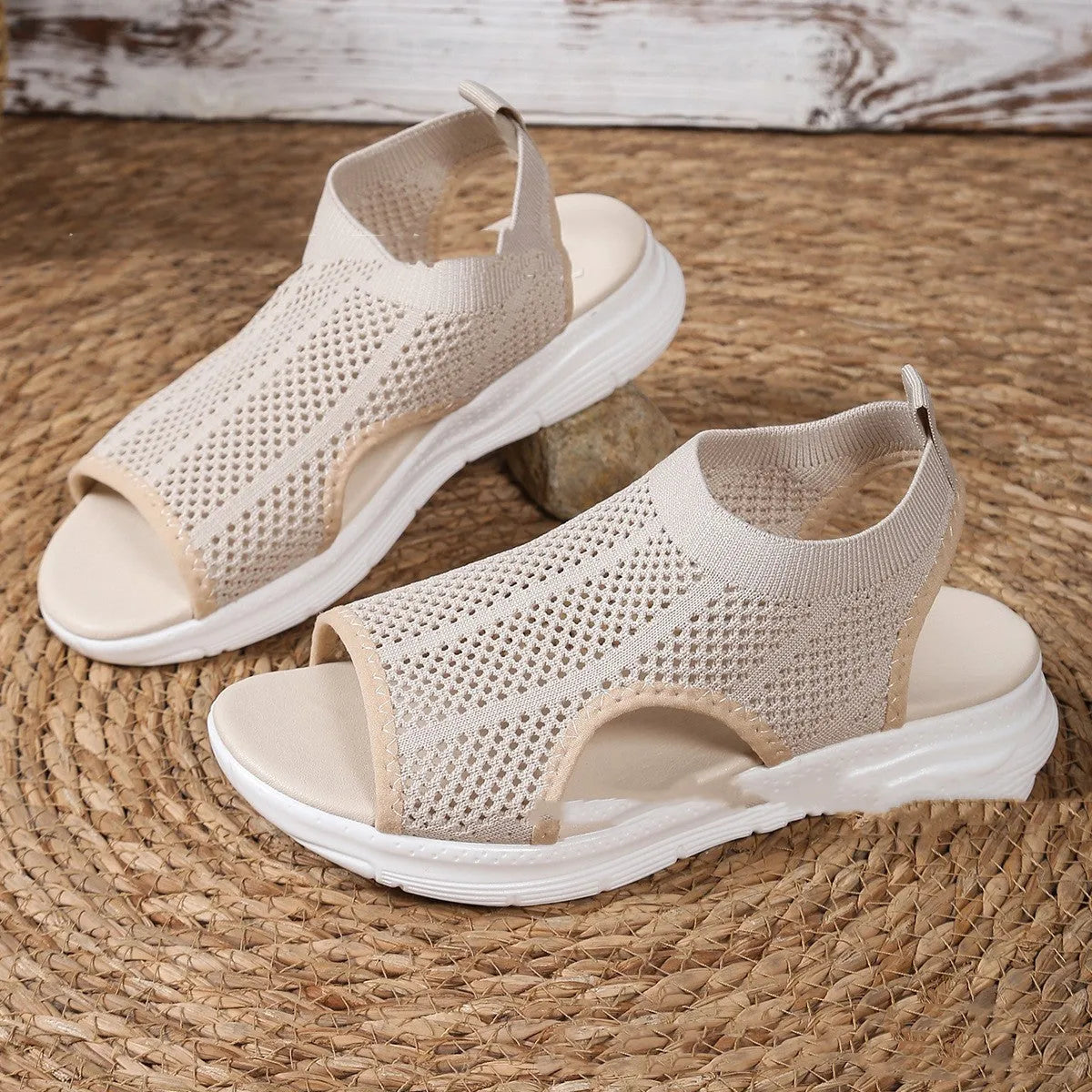 Women's black platform sports sandals with mesh lining and a flat toe bracket on a rubber sole.