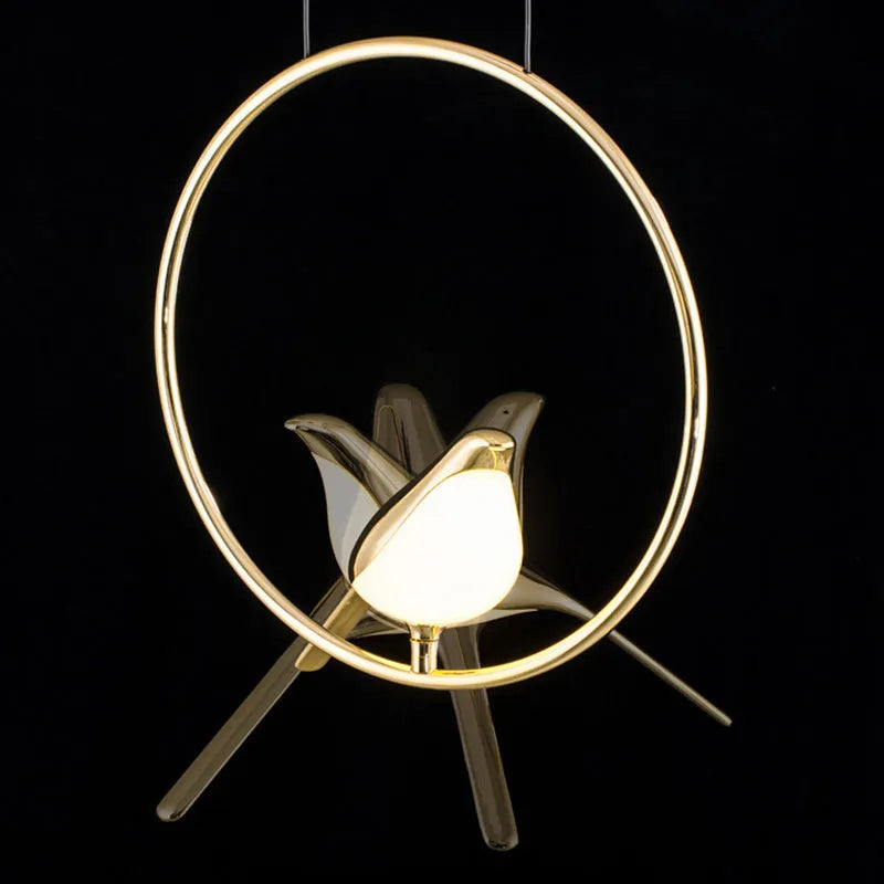 Modern minimalist magpie bird silhouette LED chandelier ceiling light made from zinc alloy and acrylic.