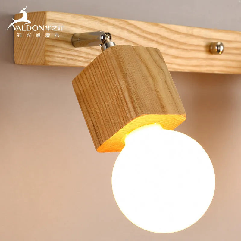 Single-head LED wall lamp with a 24cm size for mirror cabinets