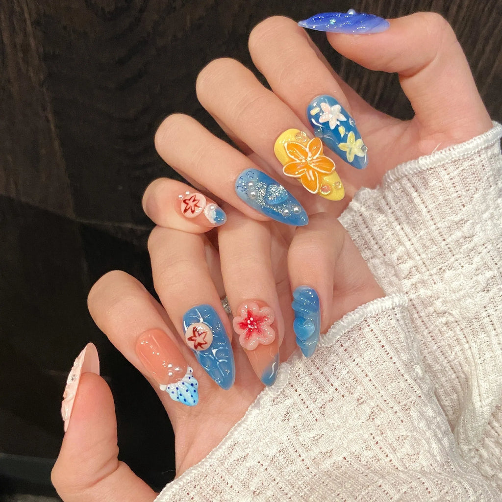 Three-dimensional carved jellyfish plastic wearable armour set in 672 almond nail colour with marine floral patterns.