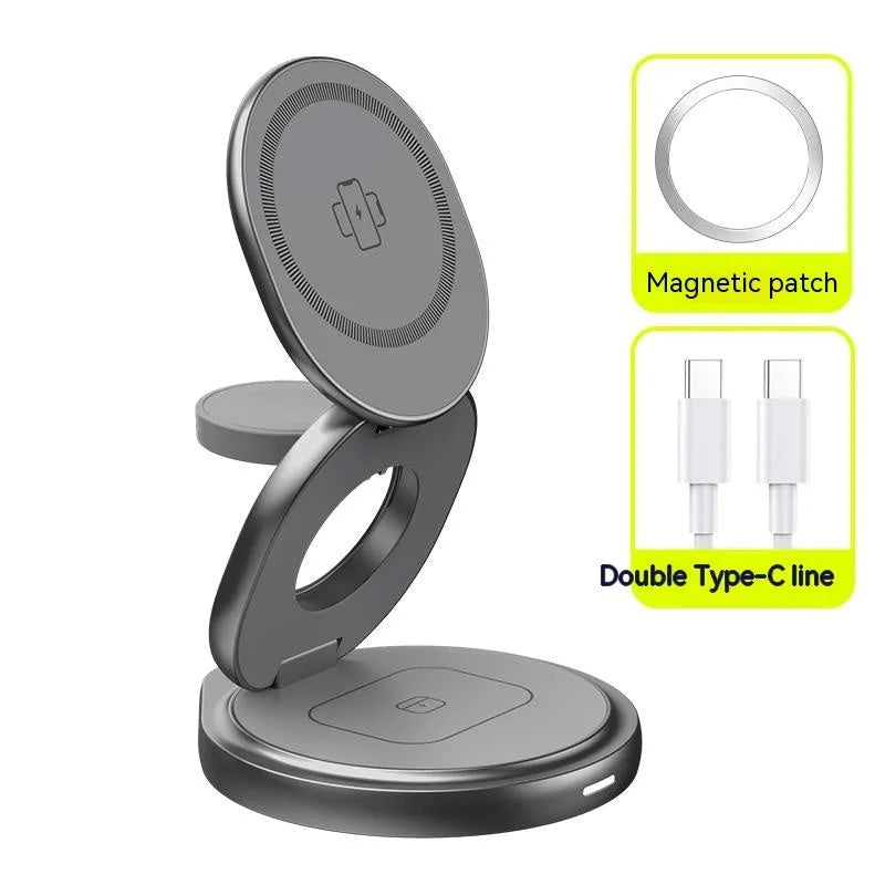 3-in-1 wireless charger magnetic folding stand in grey with phone and headphones charging on a desk