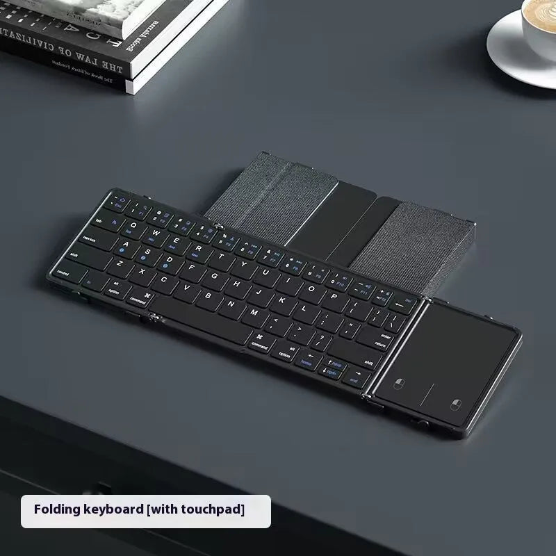 Black folding Bluetooth keyboard for mobile phones and tablets showing touchpad version