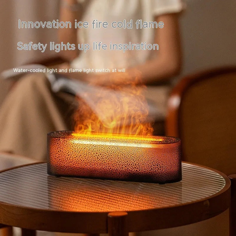 Square black creative lava USB humidifier and aroma diffuser with colourful LED flame lighting on a desk.