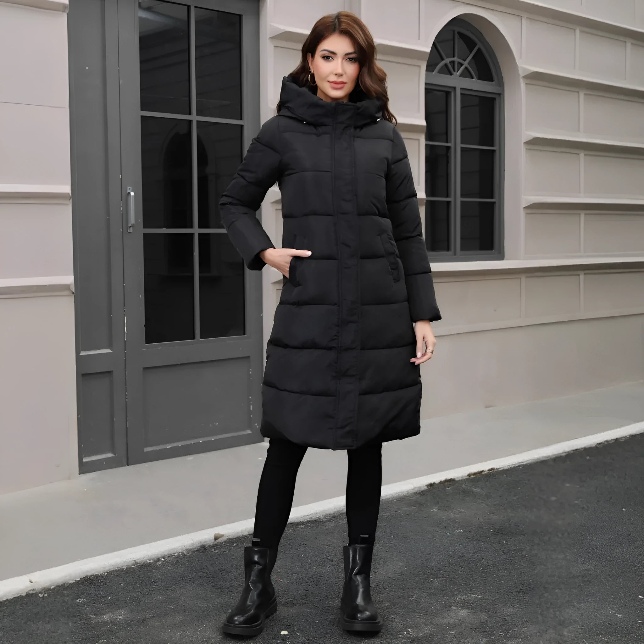 Black hooded slim fit winter jacket with long sleeves and regular fit