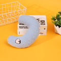 Half moon U-shaped cloth pillow for cats in blue, pink, white, and yellow colour options.