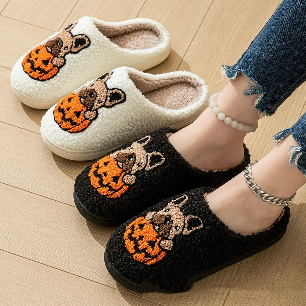 Black and white Halloween pumpkin plush slippers with round toe design and TPR rubber soles