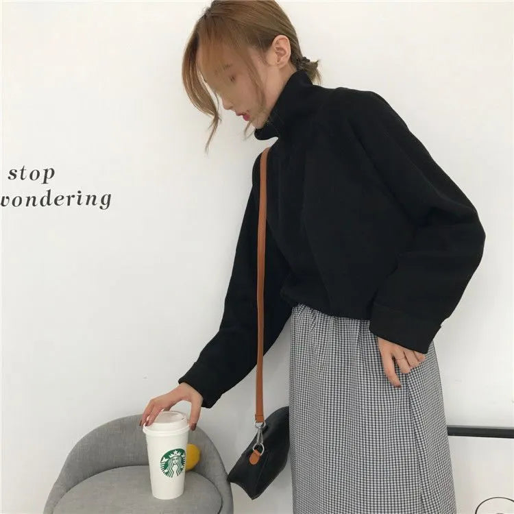 Women's half-high collar long sleeve top in polyester available in apricot, black and white colours