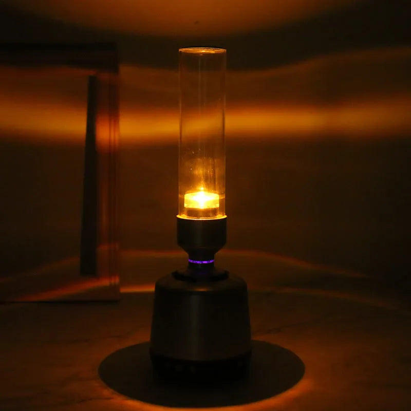 White silver Bluetooth speaker night light with candlelight effect and modern simple design