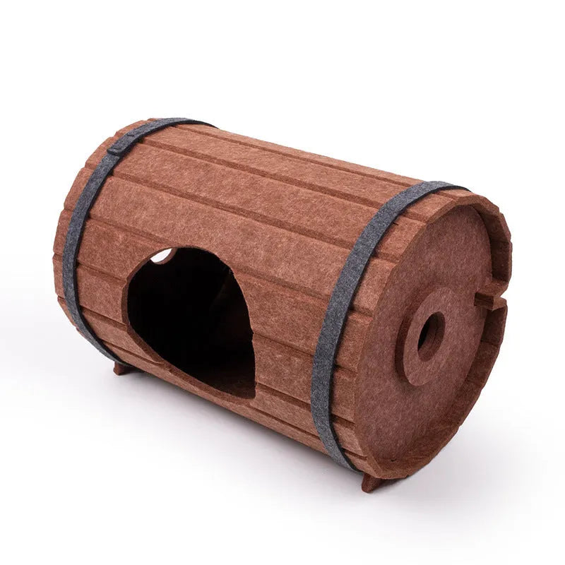 Assembled wine barrel shaped cat bed made from three grey polyester felt panels with binding straps.