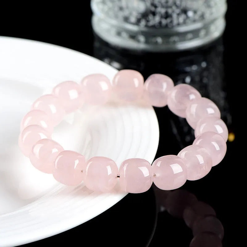 Pink natural bamboo crystal barrel bead bracelet with 11-12mm geometric beads