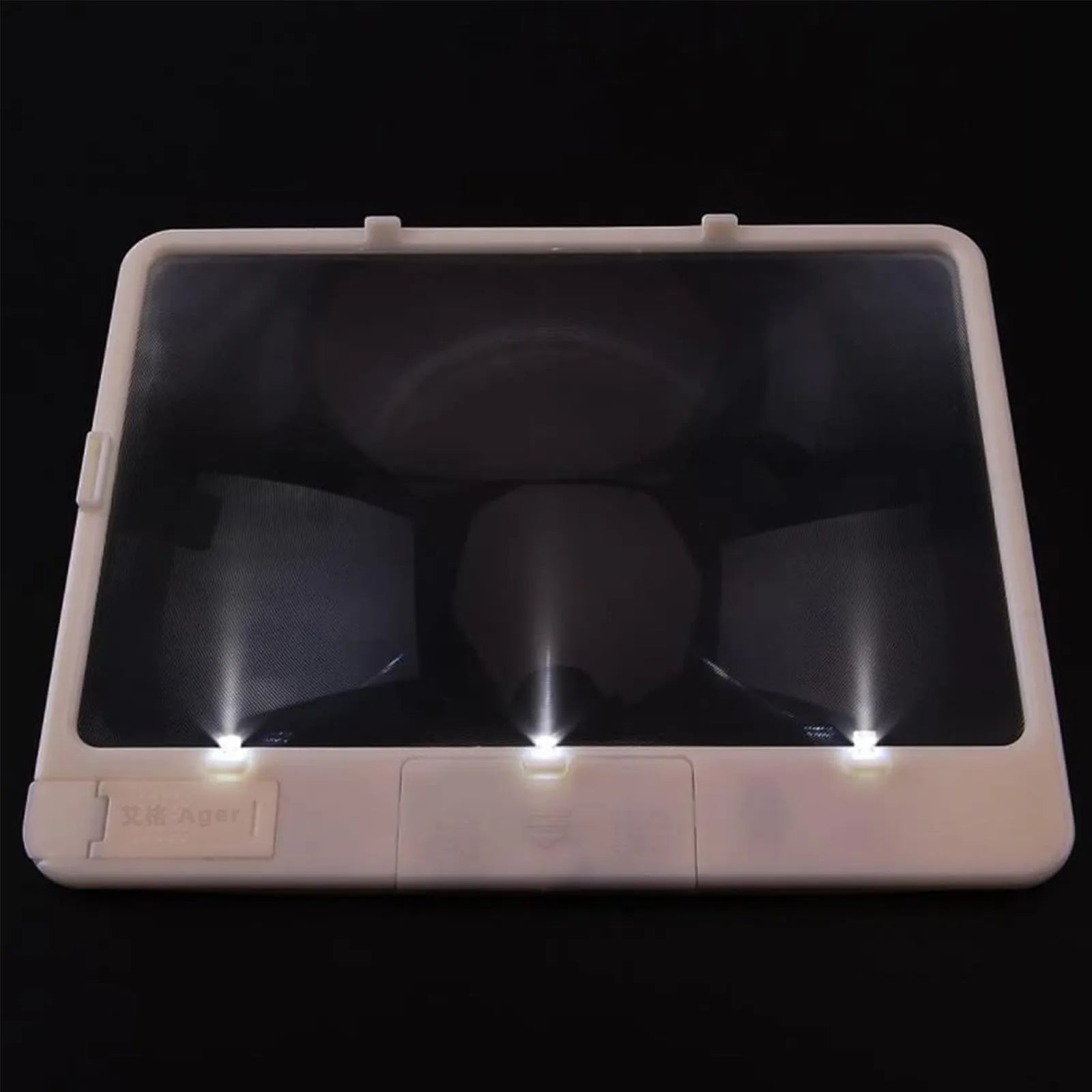 Black handheld 3x magnifying glass with built-in white LED light on a PVC handle.