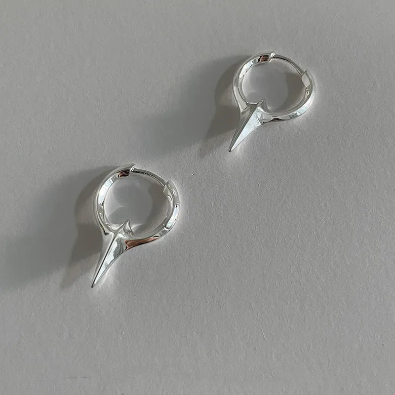 Women's geometric star ear clip earrings with electroplated white gold finish on copper
