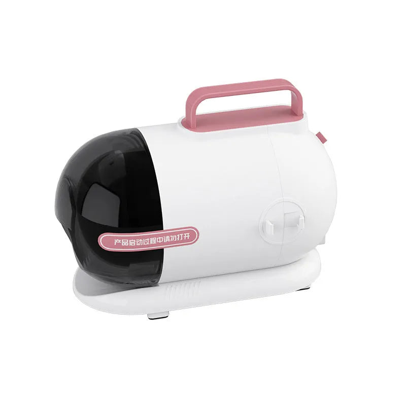 Pink and white pet grooming vacuum cleaner with shaver attachment and accessories
