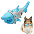 Blue silicone dog teething toy with shark-tooth texture and hollow centre for treats