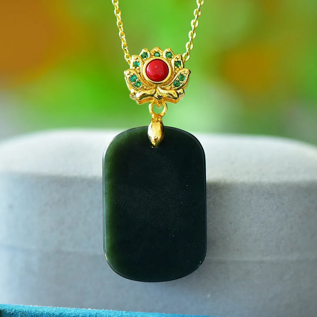 Natural gray Hetian jade pendant with copper inlay detailing on necklace