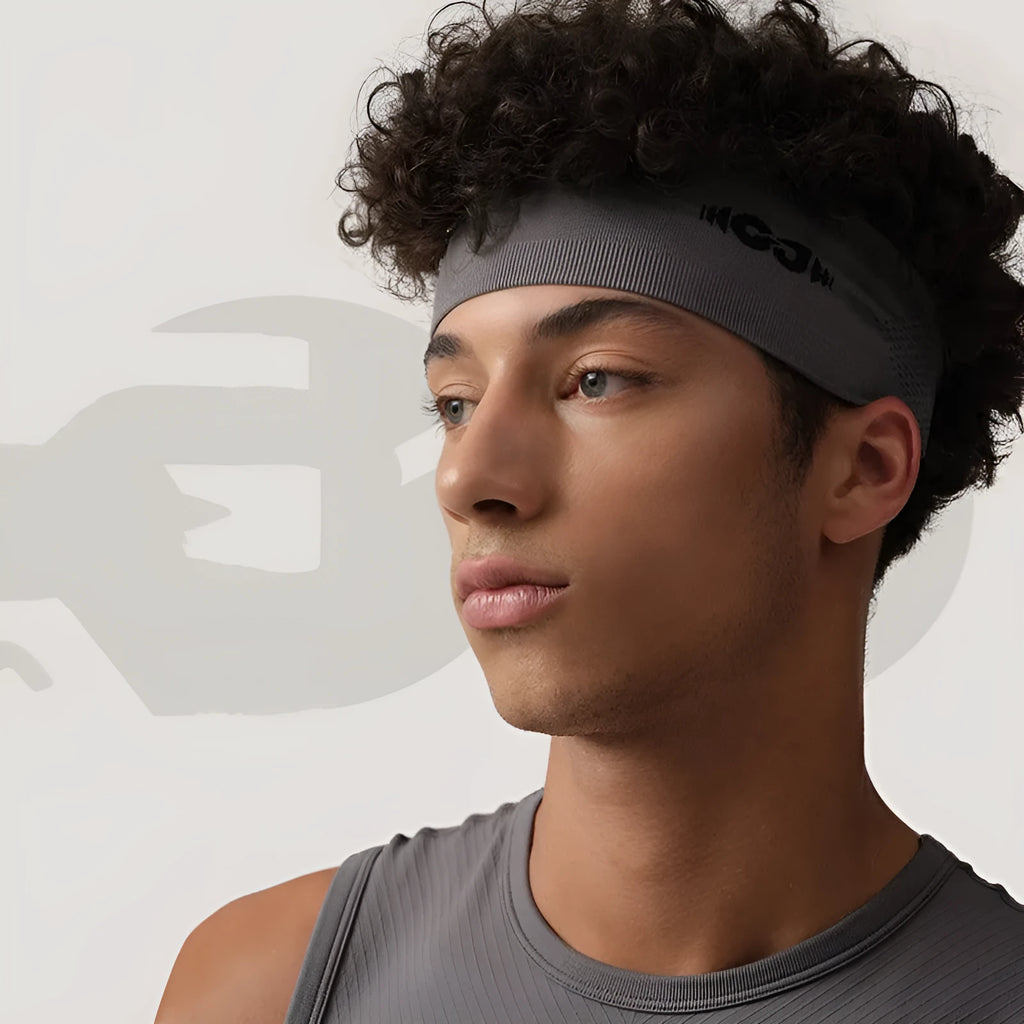 Seamless knitted exercise hair band in classic black, carbon grey, and purplish blue colours