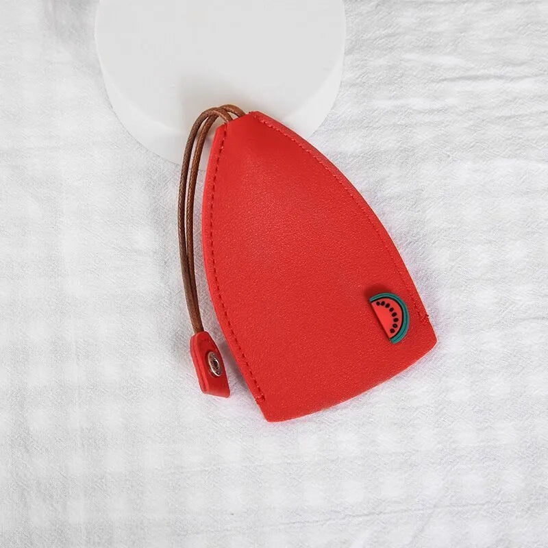 Cartoon design pull-out key case for car keys in PU leather.