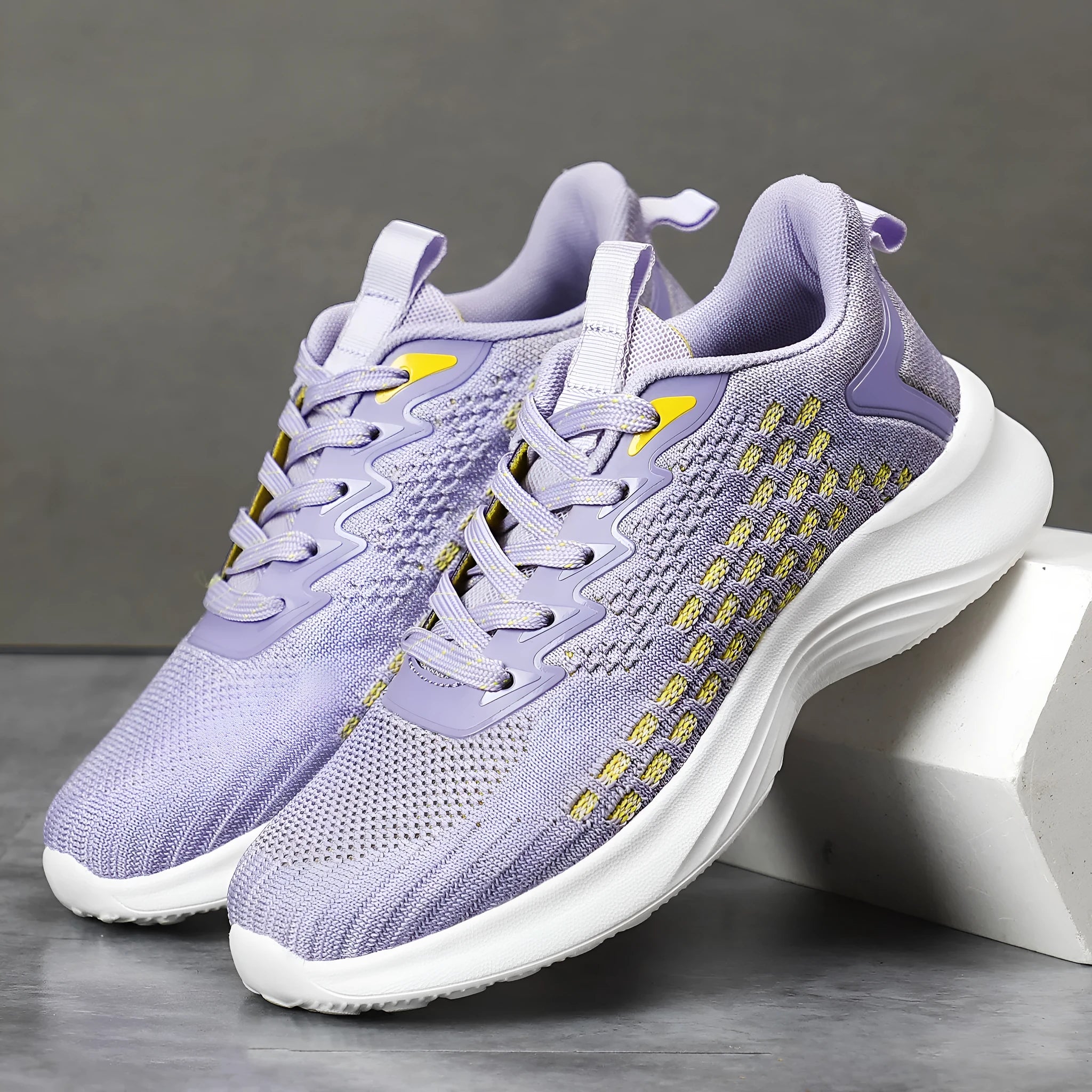 Women's lavender purple Flyknit running shoes with mesh lining and EVA sole for jogging