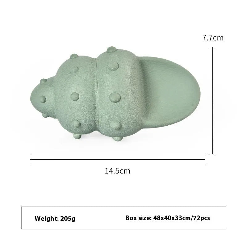 Blue rubber shark dog chew toy on a white background