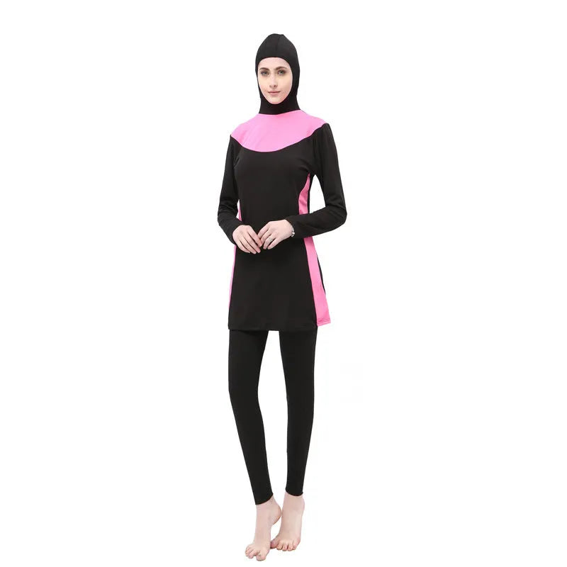 Conservative black women's swimsuit set with long sleeves, a hood, and separate pants.