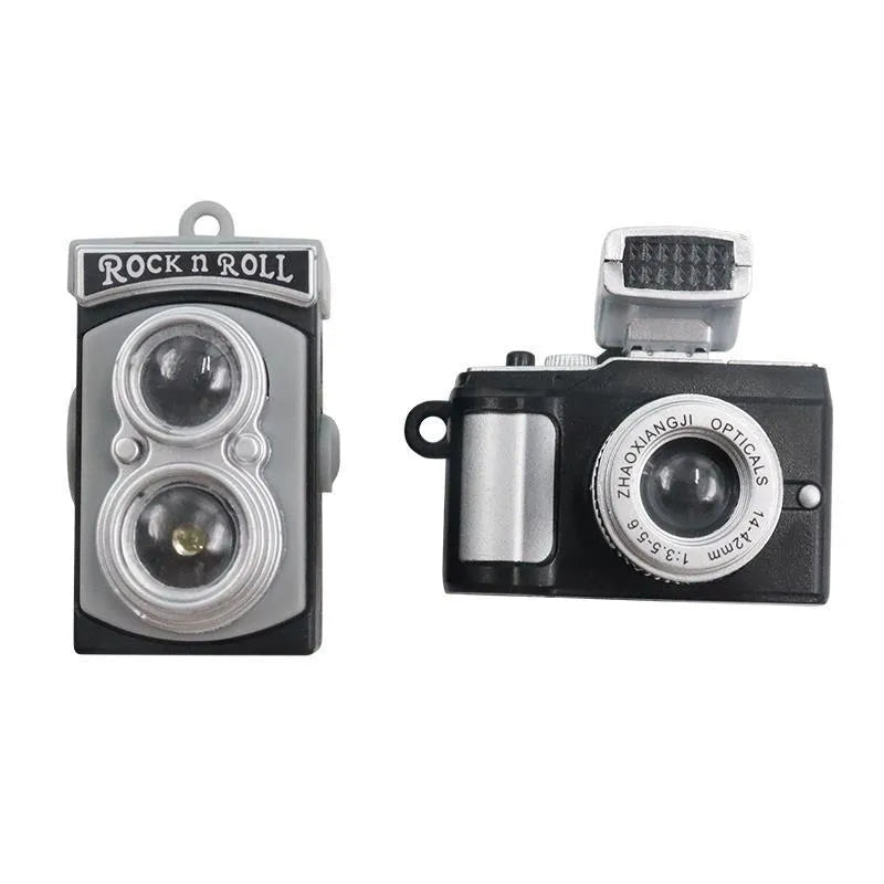 Set of four retro camera dot design plastic adhesive hooks for car interior, each measuring 4.2cm by 2.5cm.