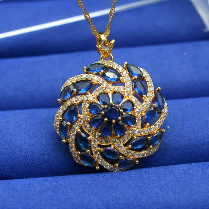 Colour zircon pendant necklace with gold plated copper flower shape and spiral design
