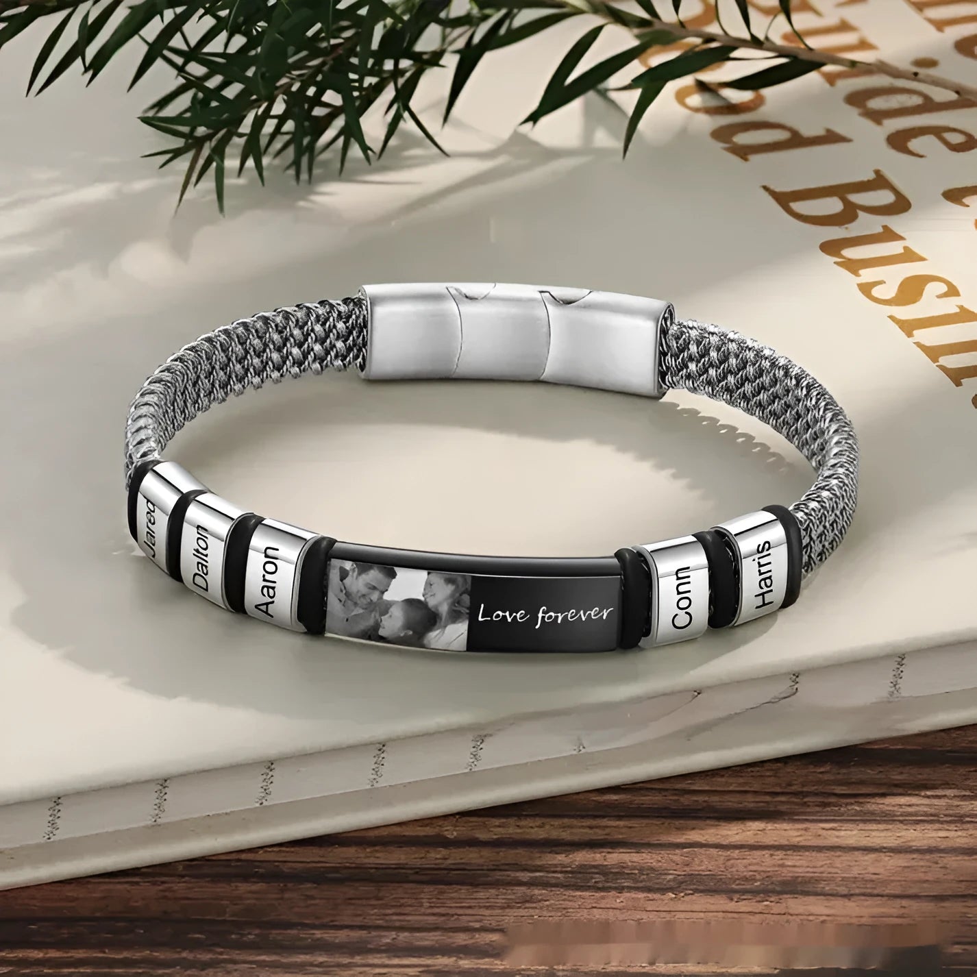 Men's heart shape bracelet made from titanium steel, leather, and rope with bead lettering options.