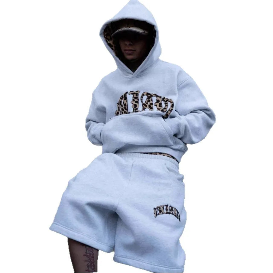 Men's grey patchwork double waist loose hip hop trousers on a white background