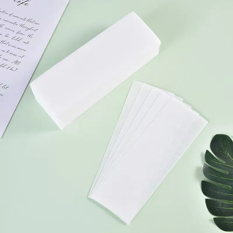 Non-woven fabric hair removal wax paper strips in pack of 50 or 100 pieces for cold wax treatments