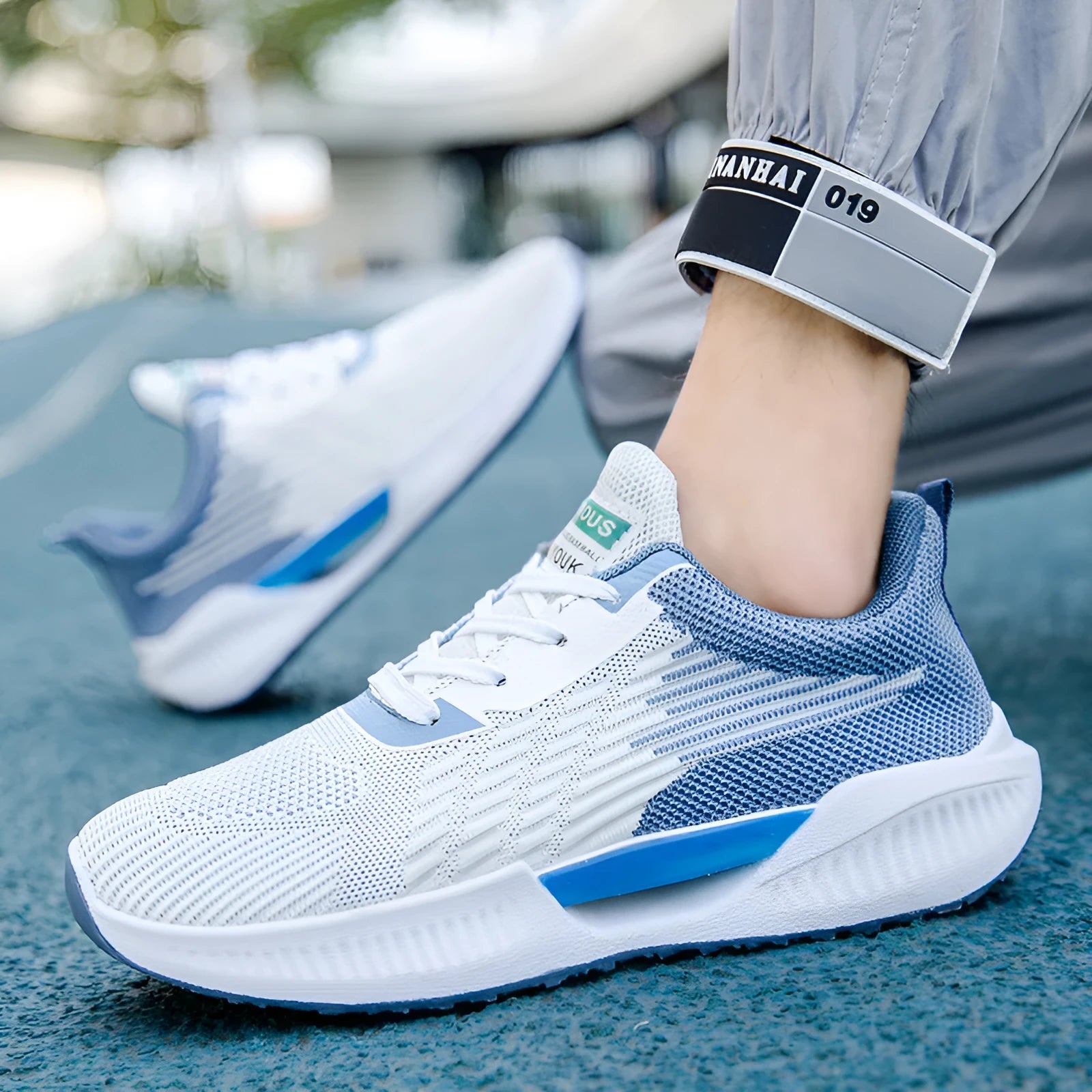 Men's blue casual sports mesh shoes with cloth upper and round toe on injection moulded sole