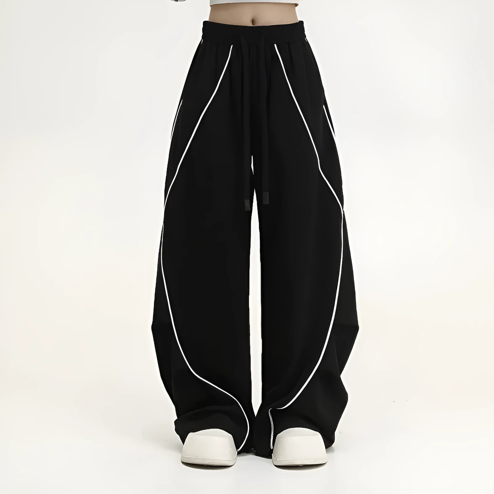 Black pleated hip hop trousers with wide-leg design and striped pattern
