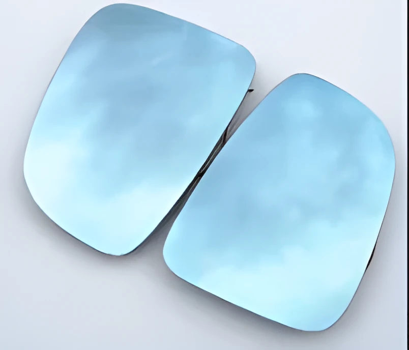 Blue reflective rearview mirror reverse lens attached to car mirror for enhanced parking safety