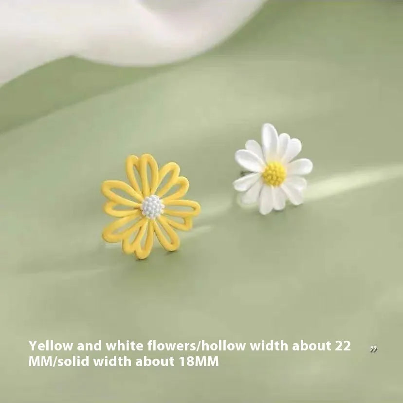A pair of alloy cartoon flower stud earrings in blue and orange two-tone colours.