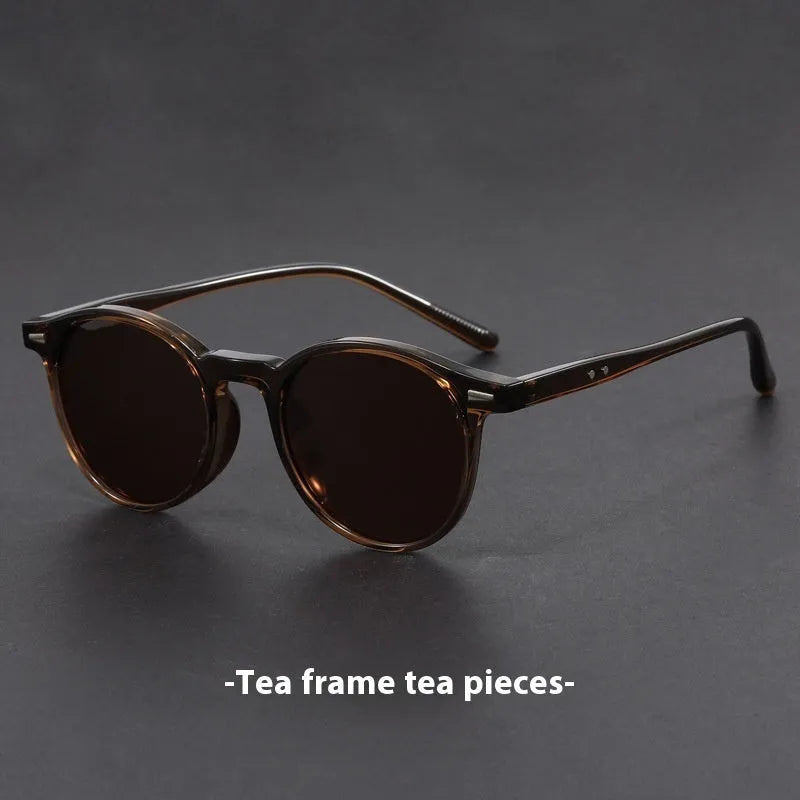 Retro sunglasses with round frame and polarised grey lenses in multiple colour options