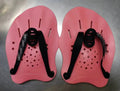 Swimming training paddles with webbed fingers in multiple colours and sizes for freestyle stroke technique