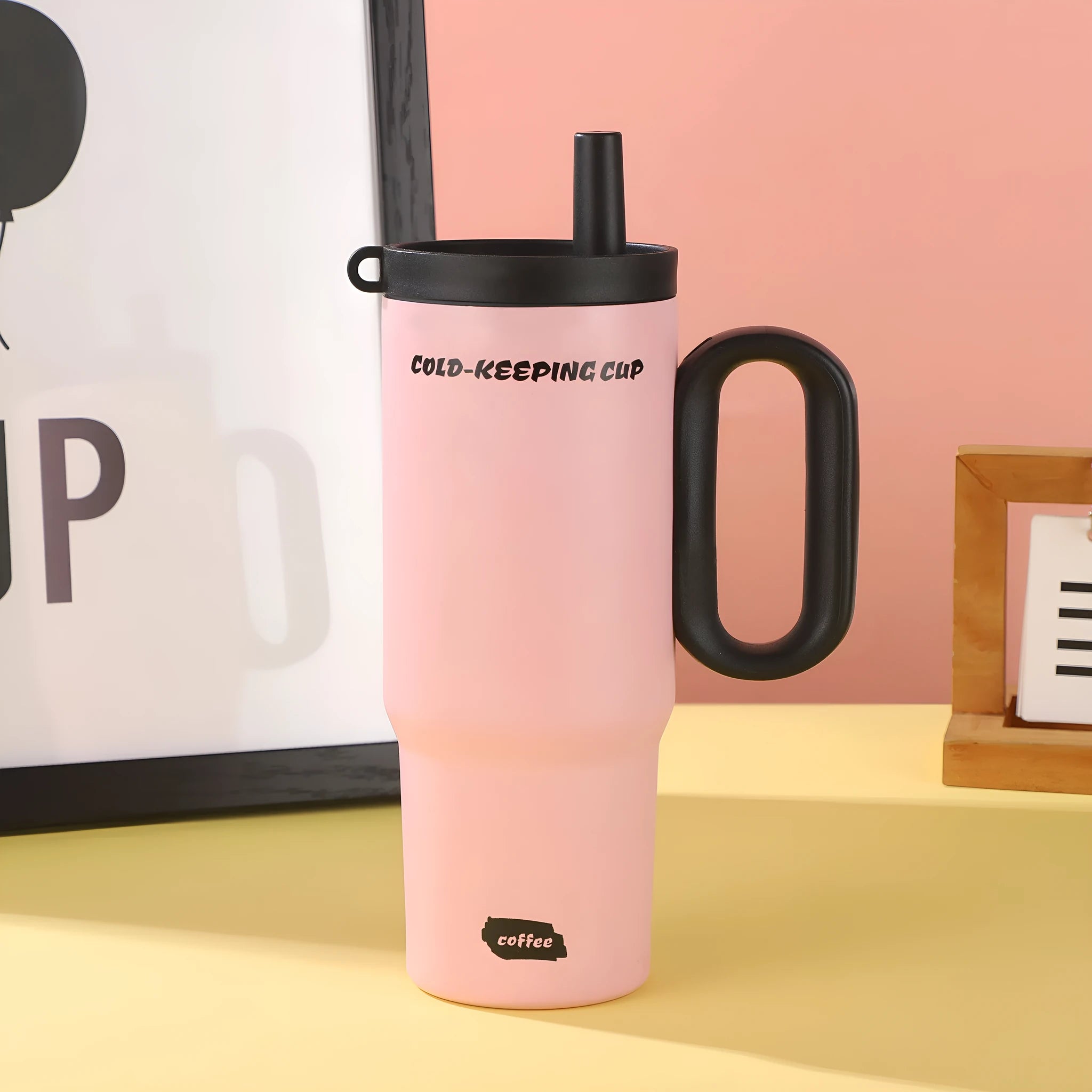 Large insulated straw cup with handle in multiple colour options showing temperature retention features