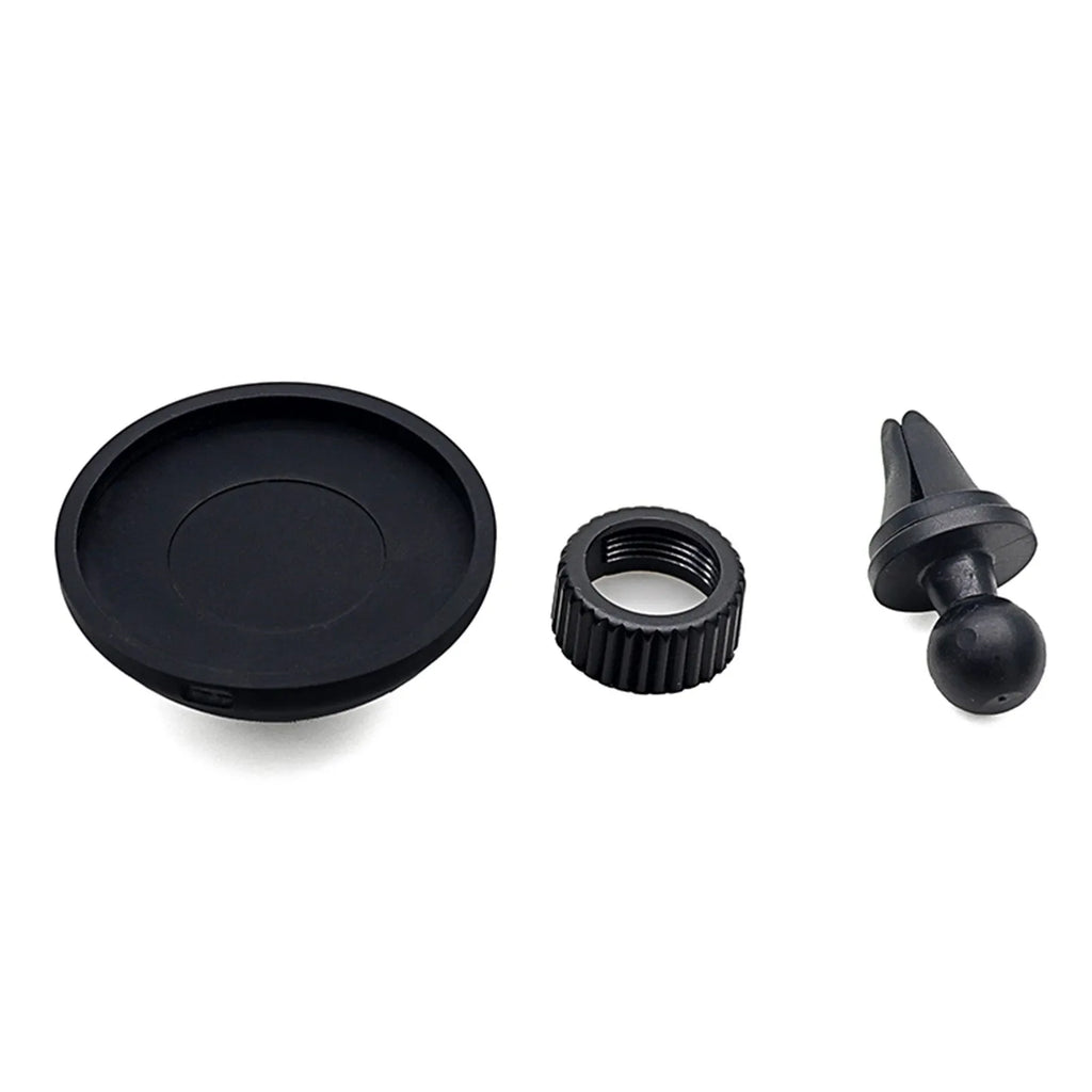 Black car magnetic mobile phone holder mounted on vehicle dashboard