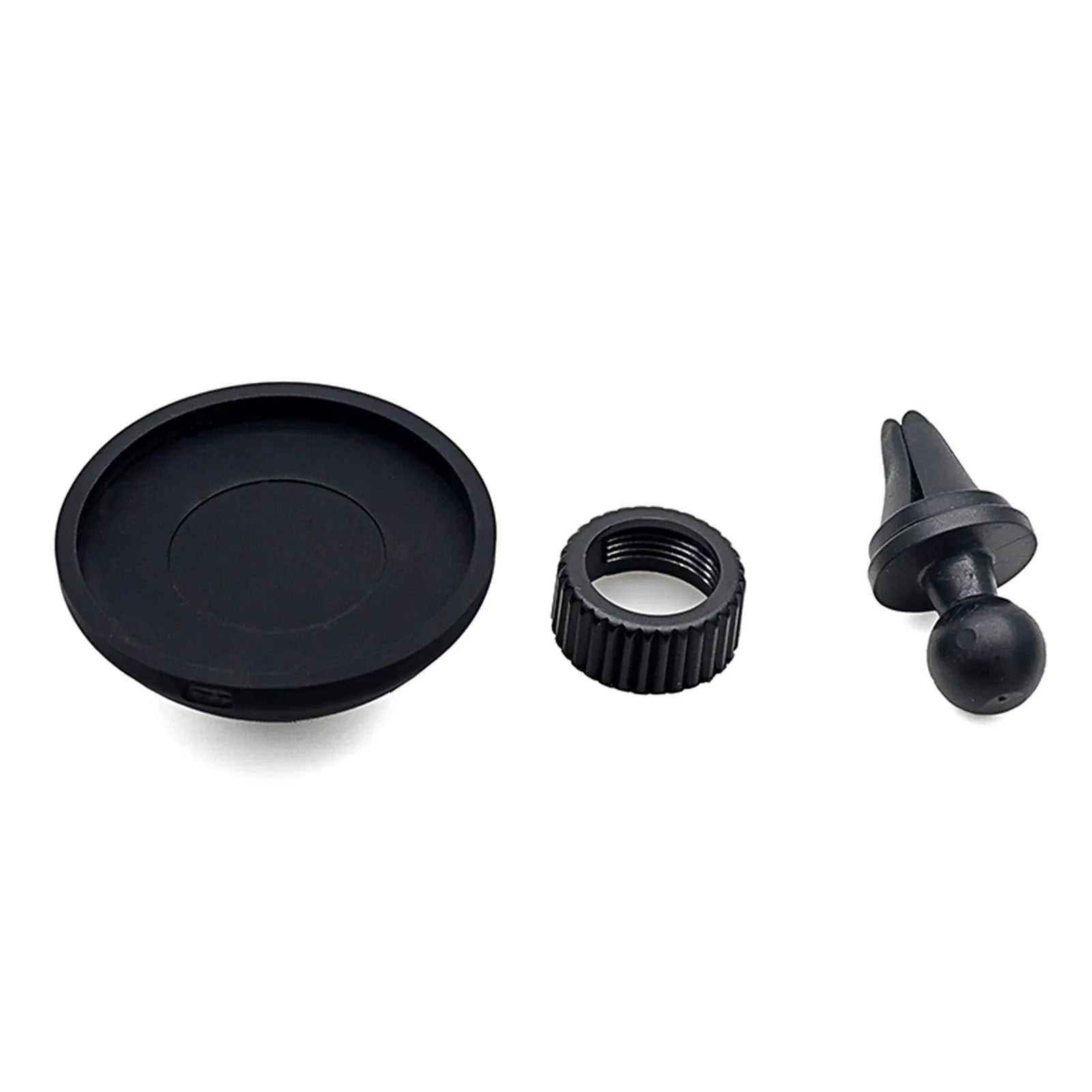 Black car magnetic mobile phone holder mounted on vehicle dashboard