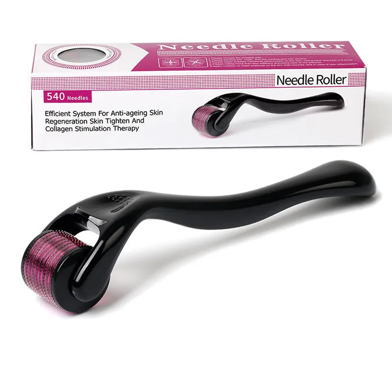 Close-up of a titanium derma roller with black handle showing the 540 needle head.