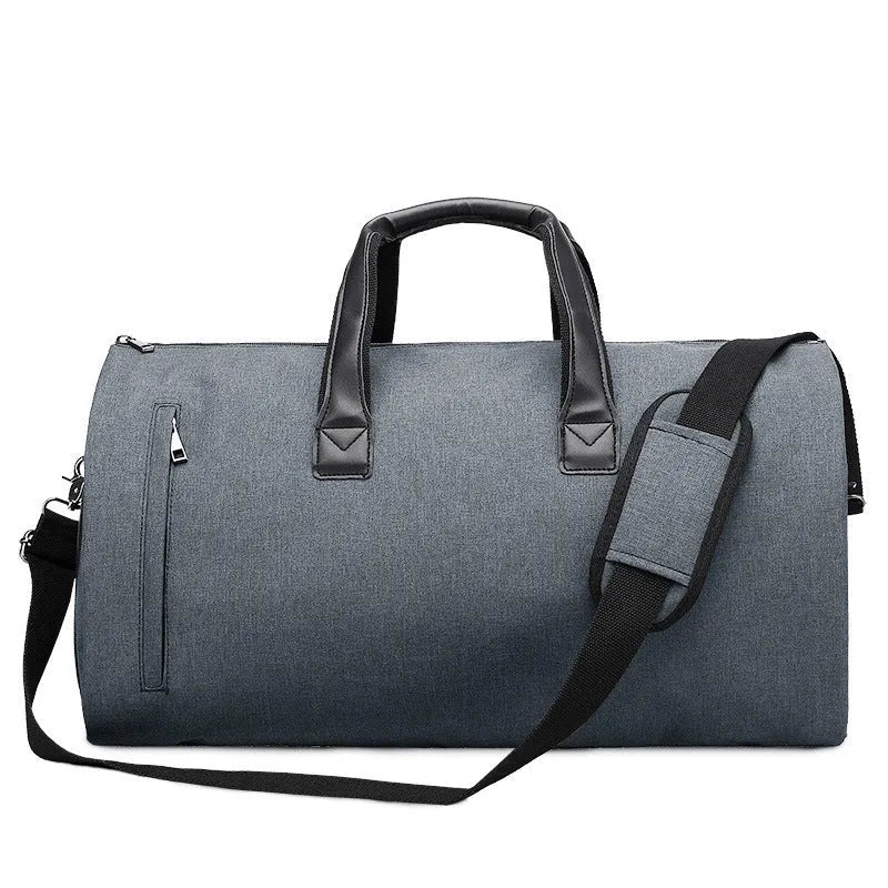 Light grey oval travel bag with multiple internal compartments including a camera insert and wet/dry separation bags.