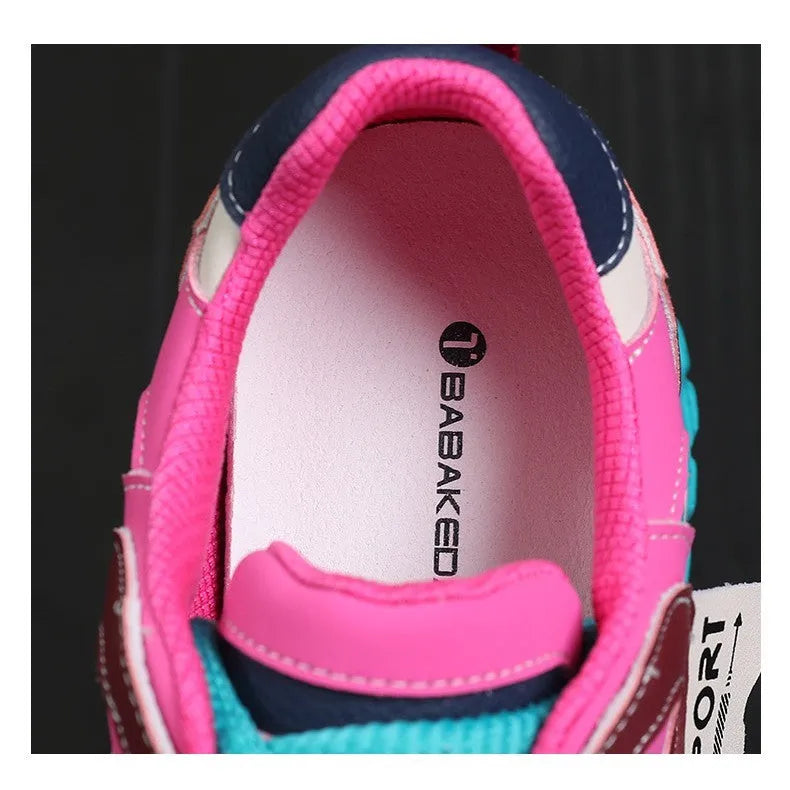 A pair of leather casual shoes with a thick wedge sole, round toe, and front lace-up design.