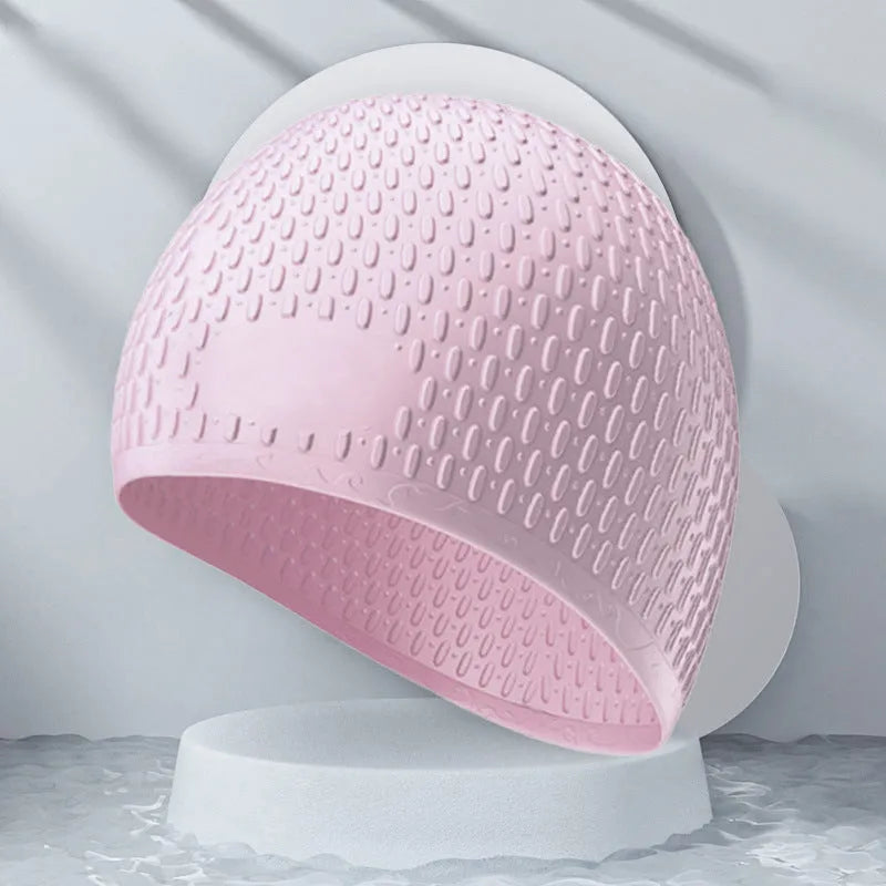 Solid colour silicone swimming cap for adults, shown in multiple colour options.