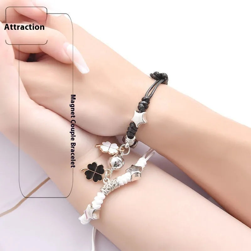 Alloy magnetic suction bracelet pair for couples with symbolic design options