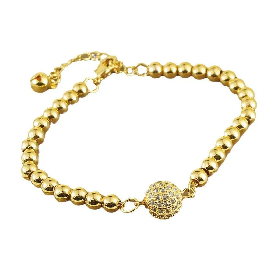 Women's heart-shaped copper bracelet with zircon stones in an Arabic style design.