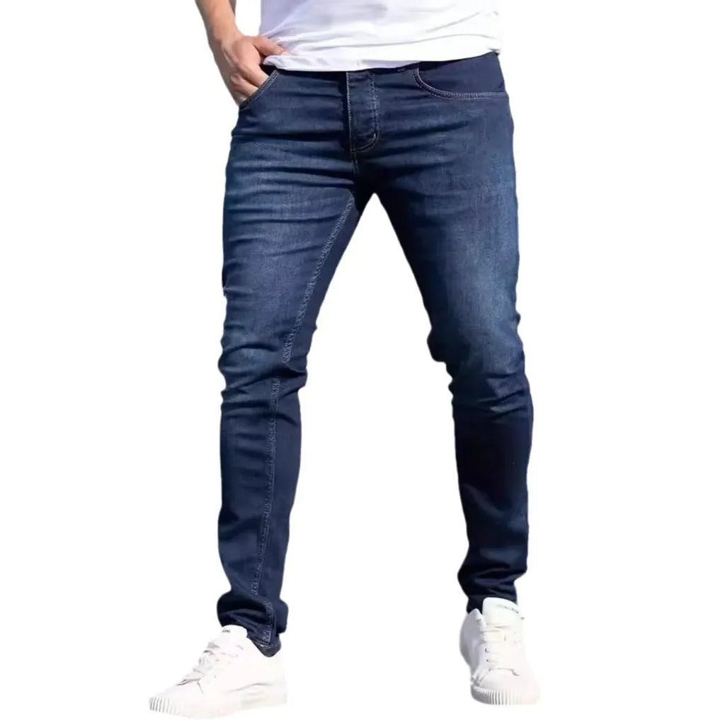 Men's dark blue slim street fashion jeans with mid waist and zipper fly